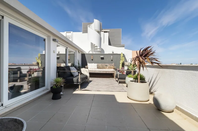 4-Bedroom Duplex Penthouse with Expansive Living Areas, Panoramic Terrace, River & Basilica Views, a