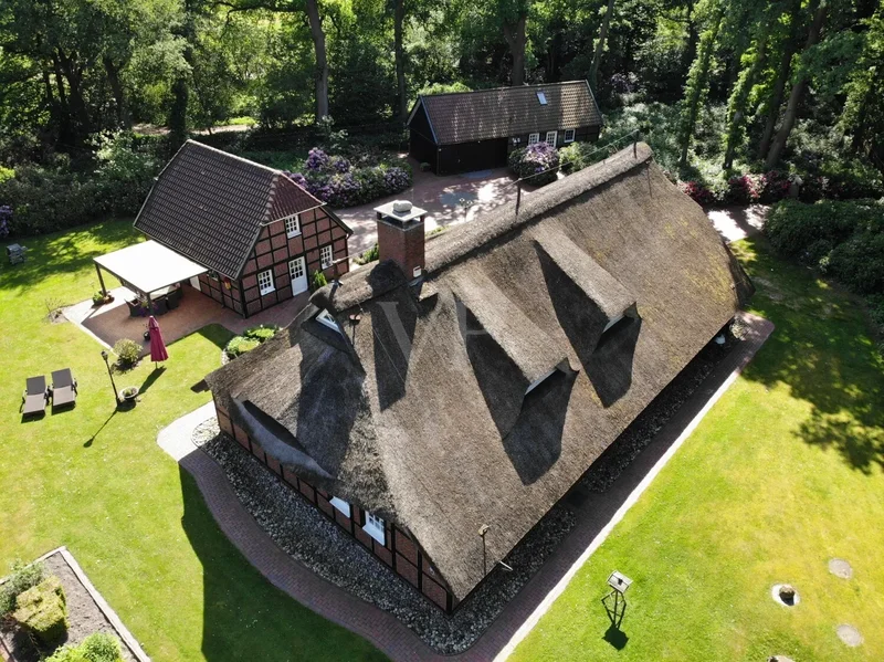 Luxurious thatched roof property with spacious grounds in an idyllic location