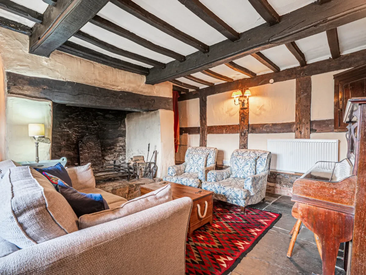 A beautifully restored 17th-century Welsh farmhouse set in the Berwyn Mountains, offering four bedro