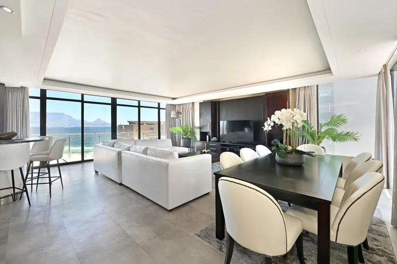 Luxury 3-Bedroom Penthouse Framed by City Lights and Table Mountain