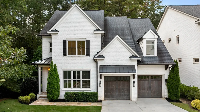 Luxury Brick Home With Dual Primary Suites And Finished Terrace Level