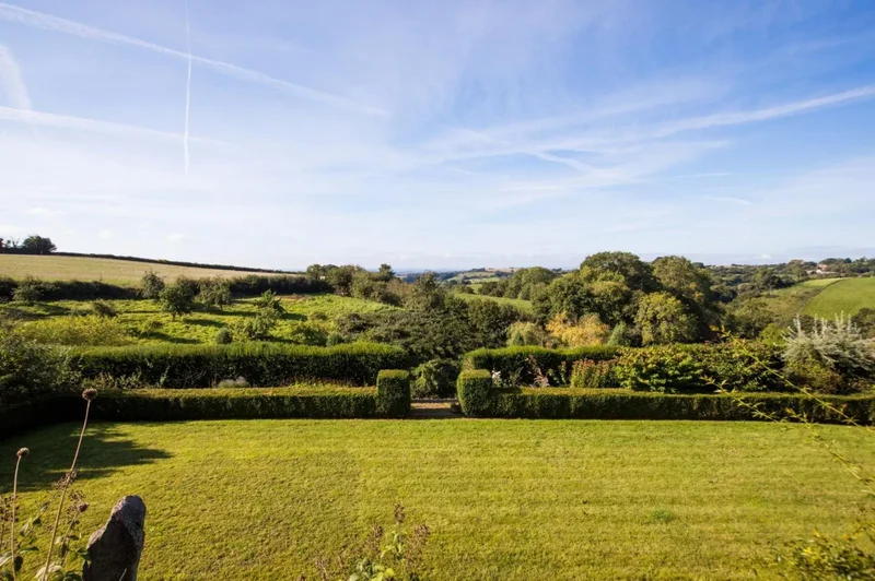 An exceptional Grade II* listed manor house, nestled amidst unspoilt Devon countryside