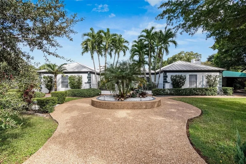 absolutely stunning LAKEFRONT POOL HOME