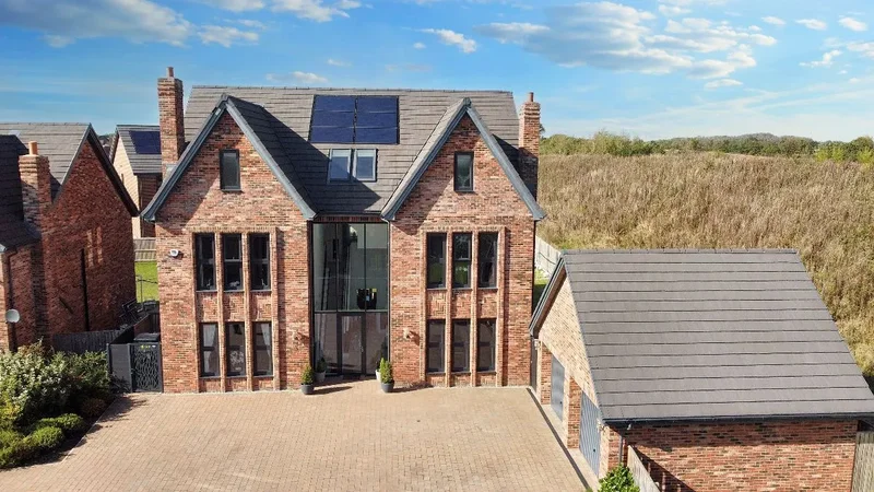 Prestigious 6-bedroom Dere Street Stag home in Wynyard. Features dramatic atrium, open-plan living,