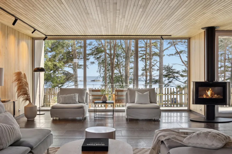 Unique Architect-Designed Beachfront Home with Prime Pier Location, Private Elevator & Guest Wing