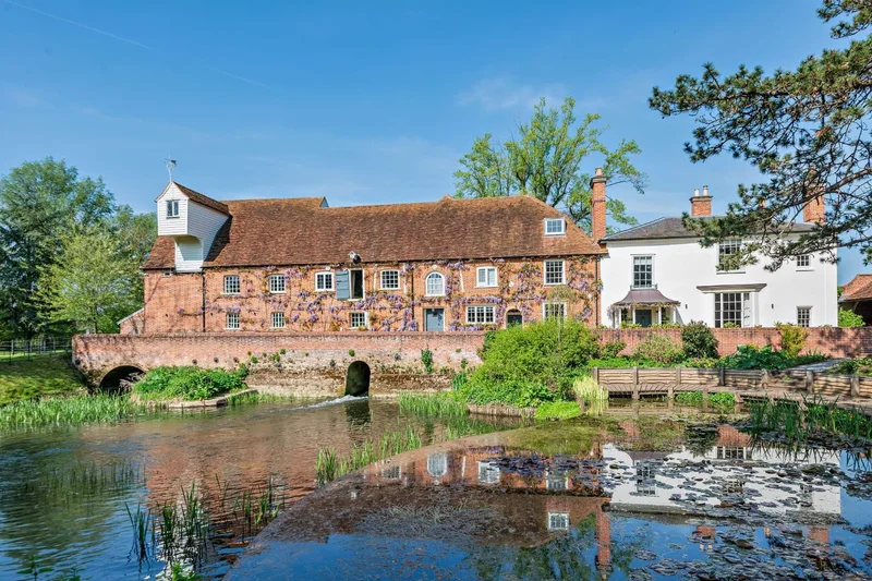 A meticulously restored listed Georgian Mill House with cottage. separate office and outbuildings