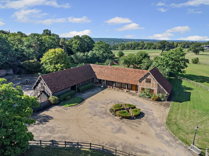 A handsome four-bedroom home with stables and walled garden in a sought-after rural setting