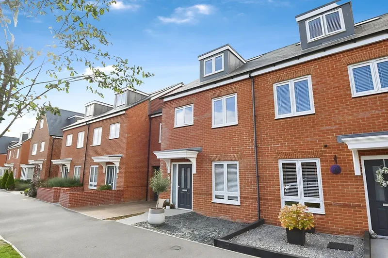 An attractive semi detached townhouse with solar panels, stylish interiors, open plan living, low ma