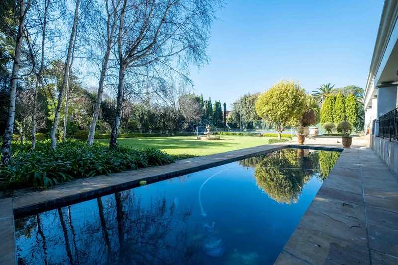 Stately and Expansive family home with tennis court.