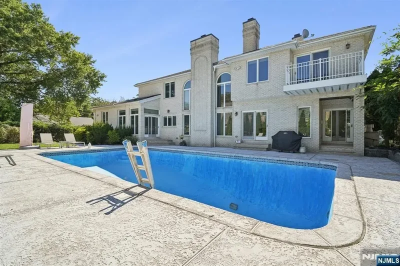 all-brick center hall colonial in the coveted North Cliffs