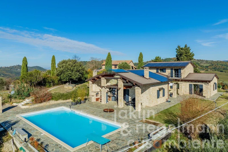 Modern country house built in traditional stone with spectacular 360° panoramic views and maximum en