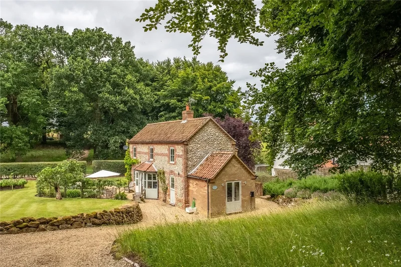 Lavender Cottage is a beautiful four-bedroom detached brick and flint home on the outskirts of Burnh