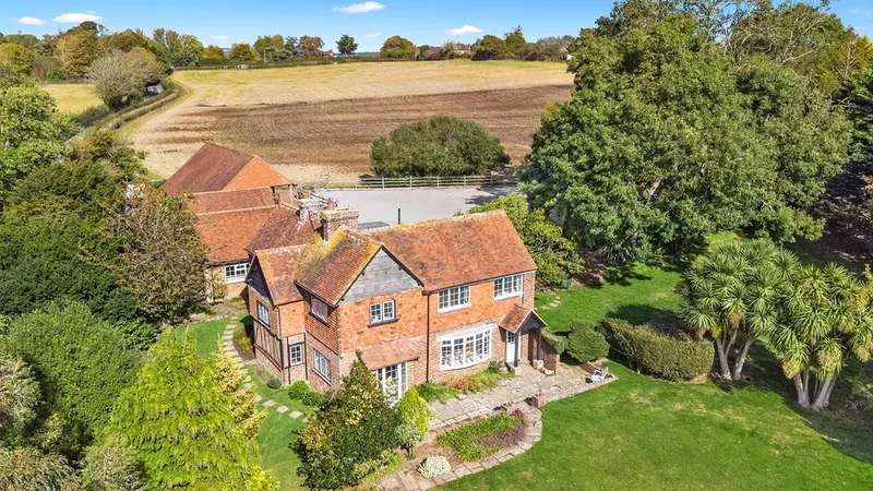 Nestled along a country road, this exceptional detached equestrian property offers the perfect blend