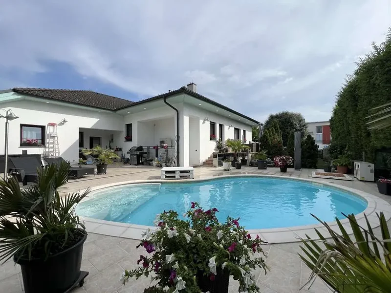 Dream House with Pool and Two Garage Spaces!