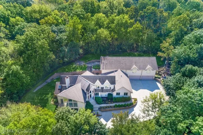 Expansive Riverfront Estate with Year-round resort living