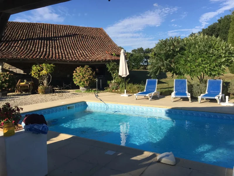A Rare Find – Two Stunning Homes, Studio, Scenic Driveway, and 14 Hectares of Private Land