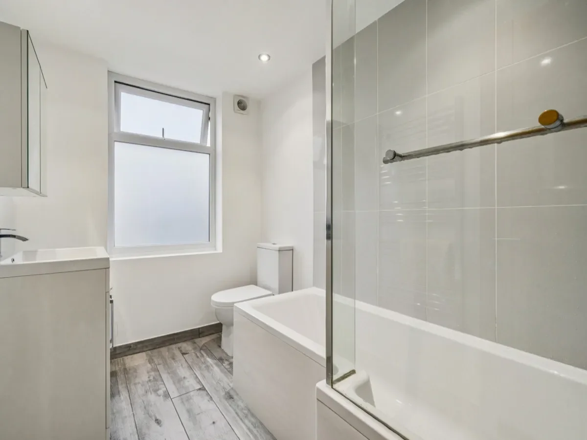 This elegant five-bedroom family home is situated on a quiet and sought-after residential street, of
