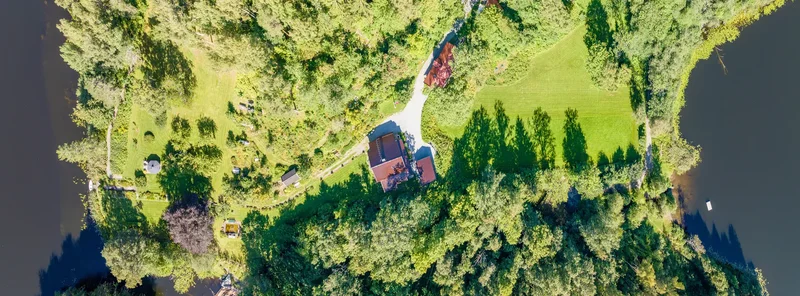 A Breathtaking Property with Historic Charm by the Golf Course | 23 Acres of Lakeside Land