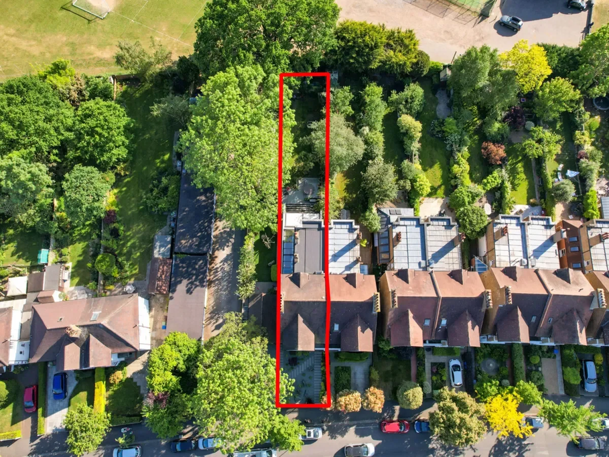 Elegant 5-bed Edwardian home with three reception rooms, large garden backing onto open sports field