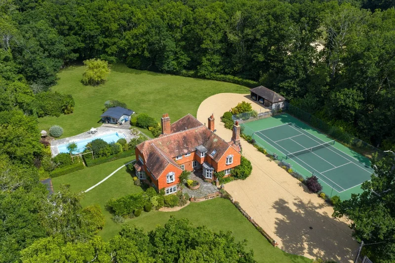 Arts & Crafts style country house with delightful gardens, pool & tennis court, in a rural setting