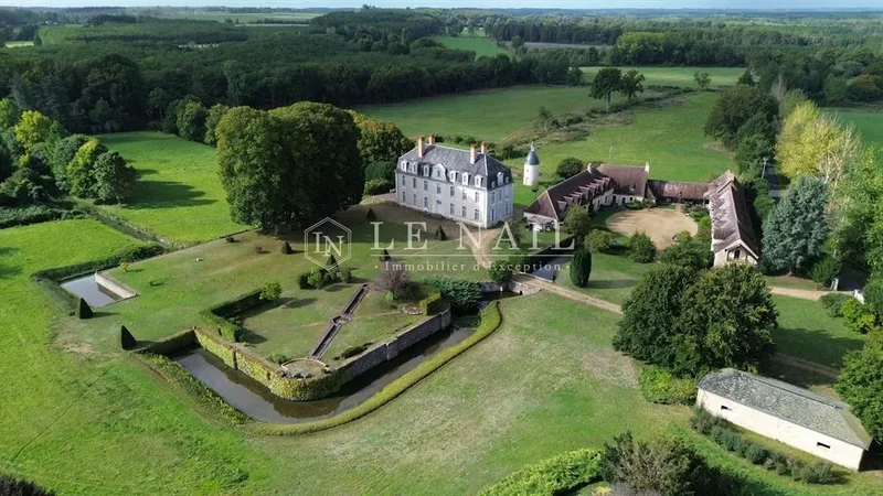 Elegant character property with outbuildings and 23 acres of land in the Sarthe region