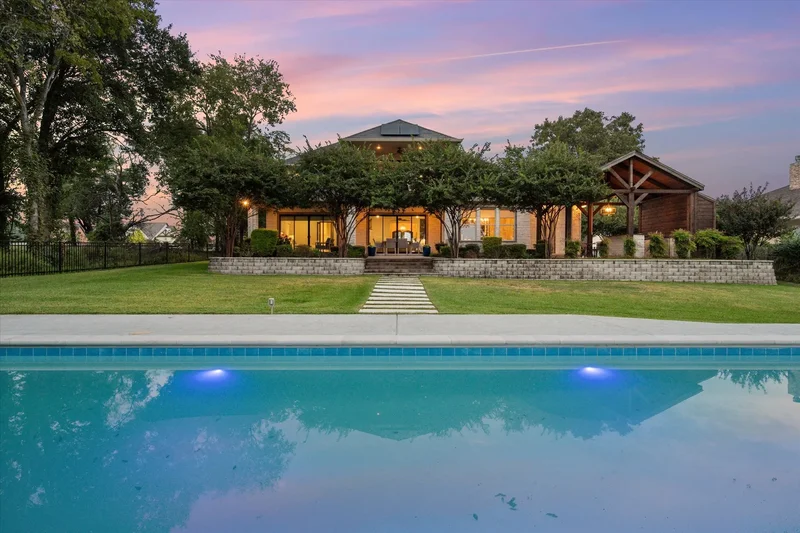 Lakefront Luxury With Pool, Boathouse, Outdoor Kitchen, And More!