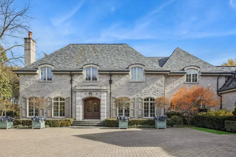 lovely French Normandy-inspired stone home