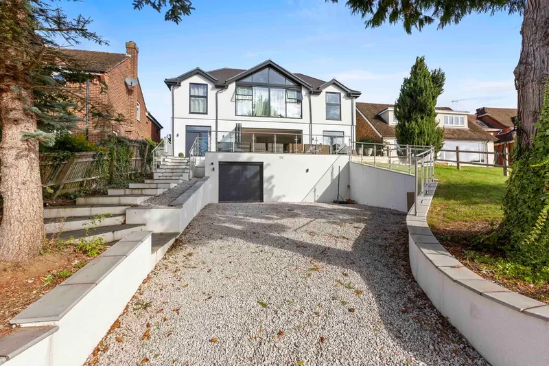 A large, immaculate, high specification family home rebuilt to a high specification in 2023 as per p