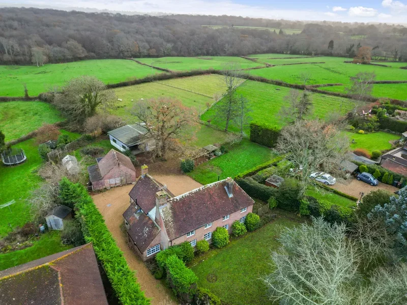 Set within approximately 2.63 acres and complemented by a range of outbuildings, this attractive Gra