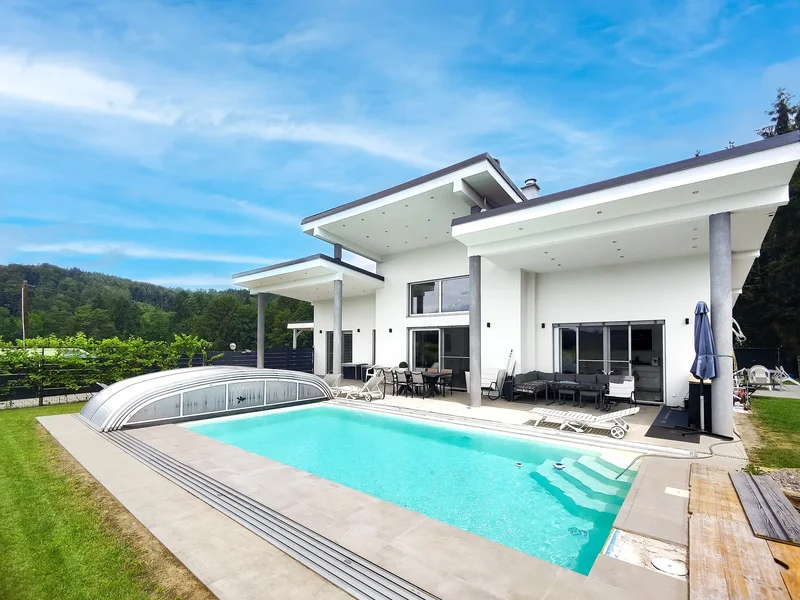 Modern Designer Home near Graz: Pool, Photovoltaics and 6m Ceilings. Premium Features Throughout.