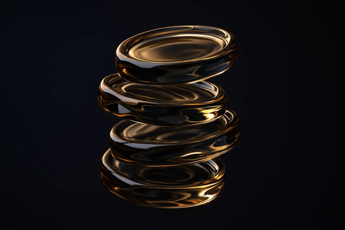 A floating stack of round glass coins